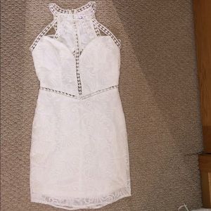 White lace dress with intricate detailing
